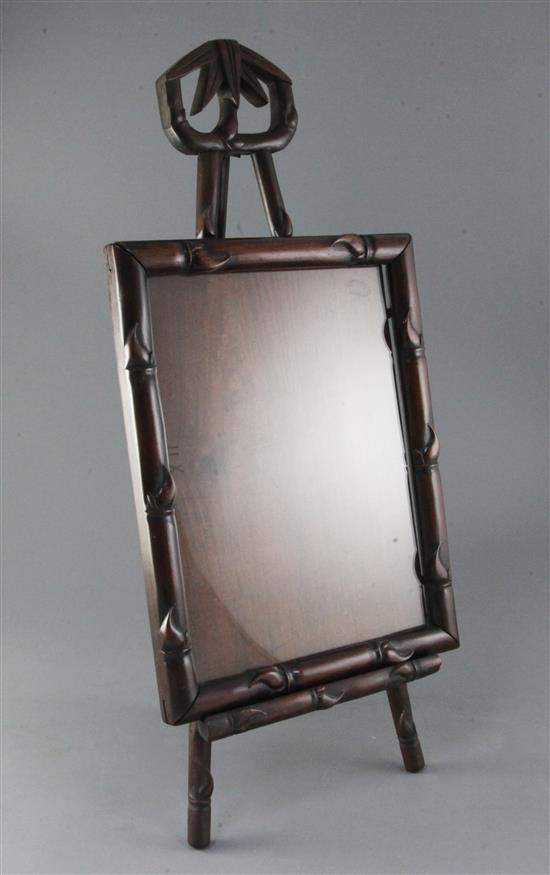 A Chinese hongmu picture frame and easel, c.1900, the frame 34.5 x 27cm, total height 60cm